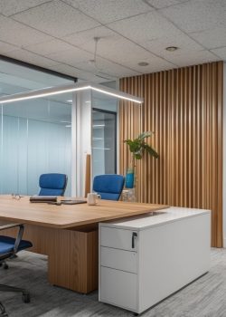 Modern office space with glass walls and city skyline view